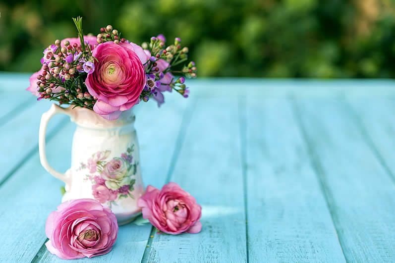 Simple ranunculus vow renewal centerpiece