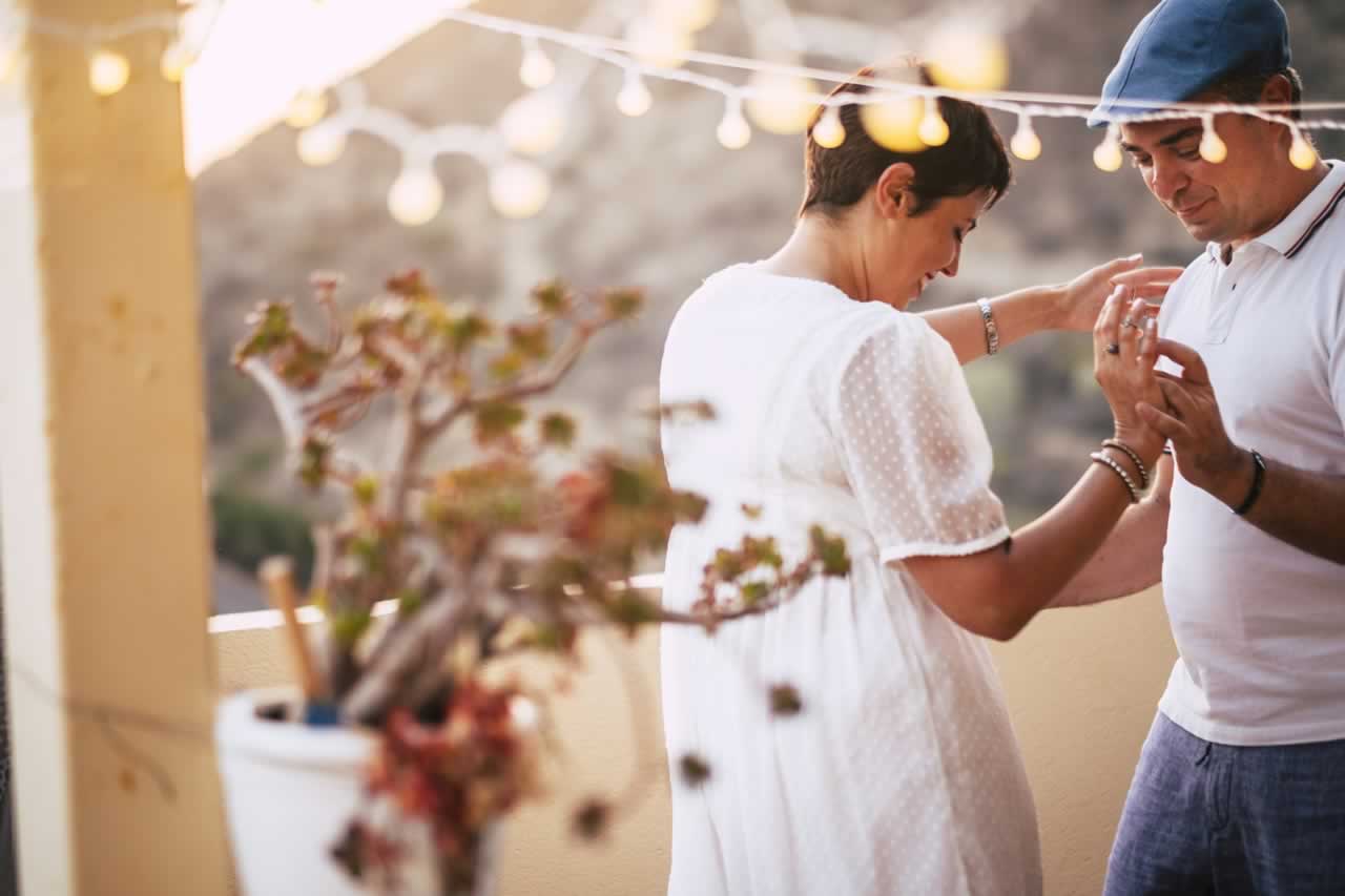rekindling-romance-middle-age-couple-dancing-s Strengthening Intimacy Through Vow Renewals: A Husband’s Approach to Rekindling Romance