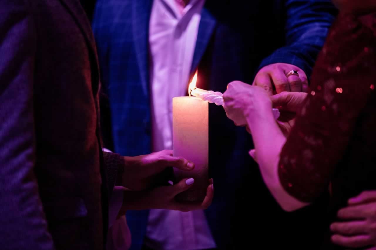 Engaging Guests with Interactive Elements: community candle lighting