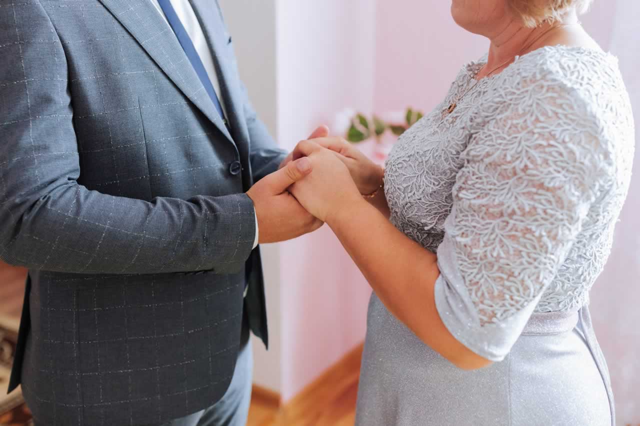 man-woman-are-holding-hands-wedding-ceremony-s How to Write Vow Renewal Vows: Heartfelt, Meaningful, and Authentic Tips